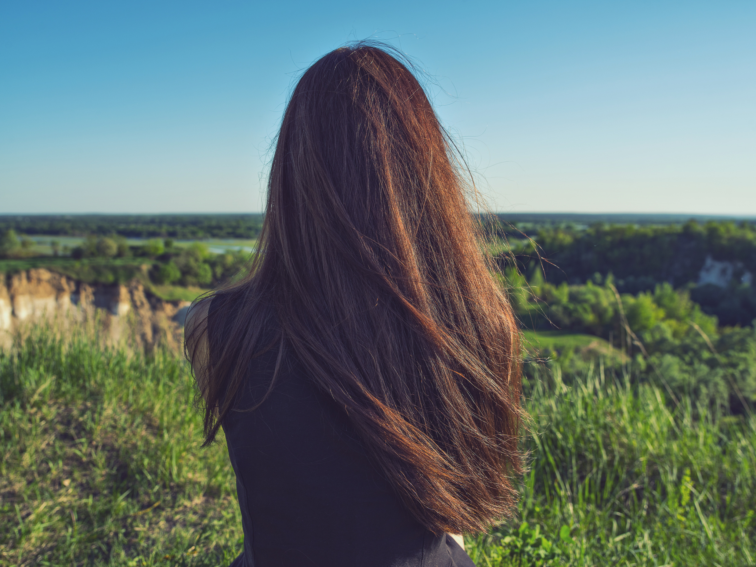 Relaxed Young Woman Looking Out into the View.